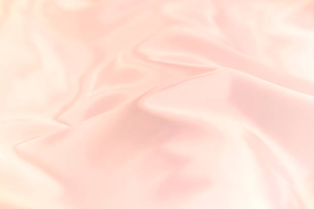 istock Soft focus of pastel color silk fabricl background texture. 1215634736