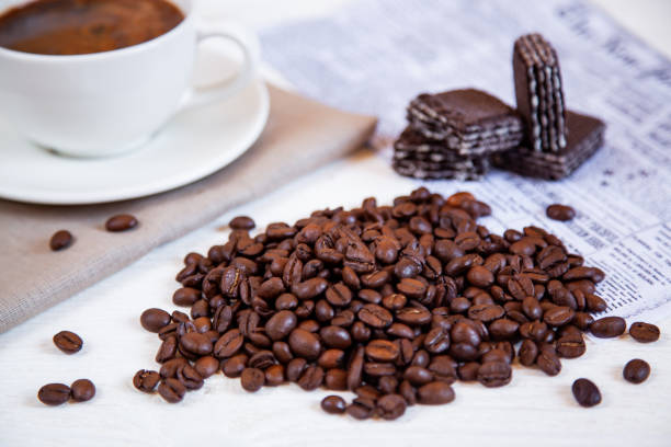 A bunch of coffee beans and some waffles.