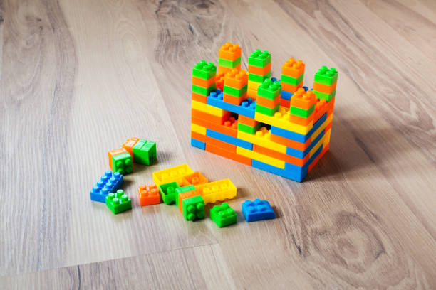 istock Children's game, the designer of multi-colored plastic blocks. Puzzle. 1215636726