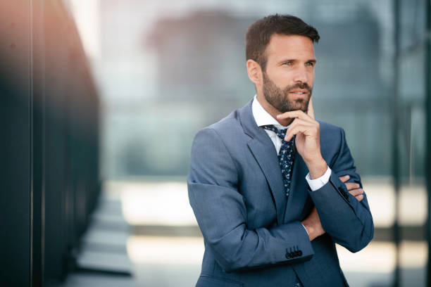istock Young man in a blue suit. 1215639131
