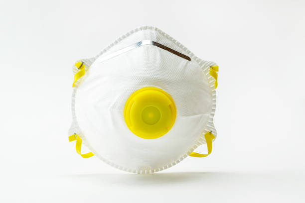 istock Medical safety filter mask on white background. Coronavirus cell Covid-19 outbreak virus protection with clipping path. Pandemic medical health risk concept.Floating China pathogen 1215640697