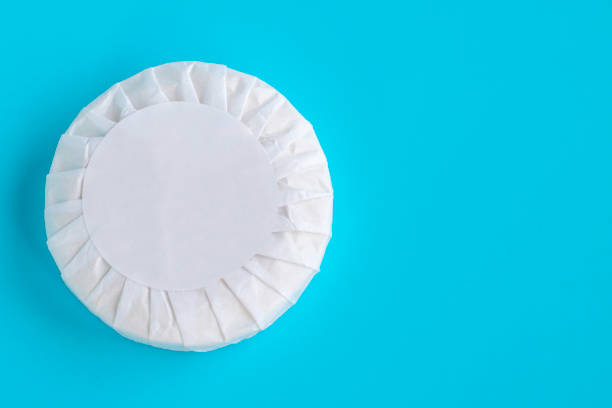 istock Mockup soap in white paper packaging on a blue background 1215643023