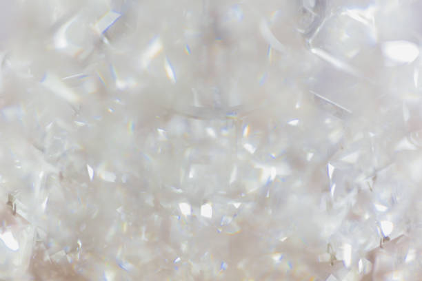 istock Blurred background texture concept of crystal light chandelier. 1215643565