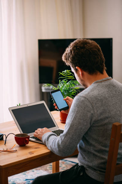 istock Man Working From His Home Due to Covid-19 1215647293