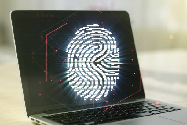 istock Double exposure of abstract creative fingerprint hologram on computer background, protection of personal information concept 1215649387