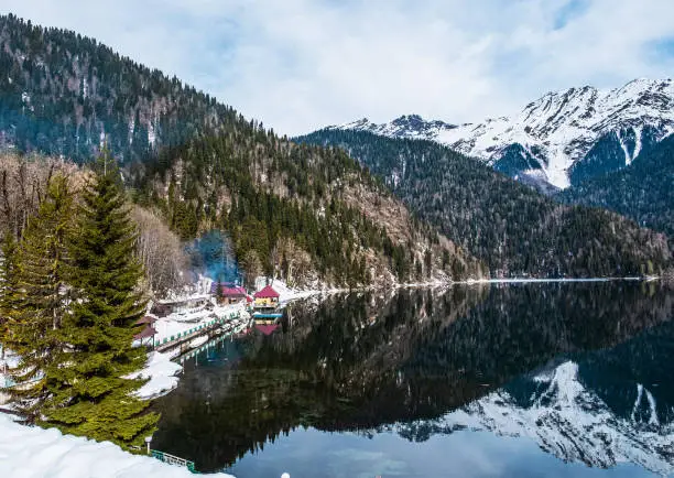 Photo of Lake Ritsa in the spring season. Located in Abkhazia, in the Caucasus Mountains.