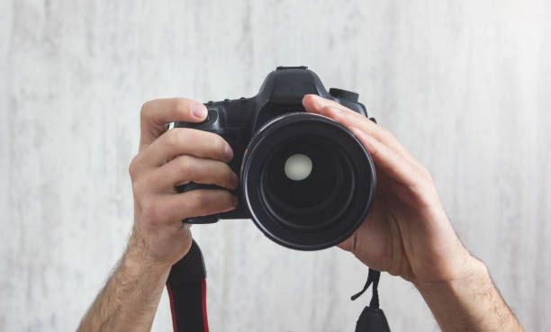 istock Photographer with a Camera. Lifestyle, Work 1215651493