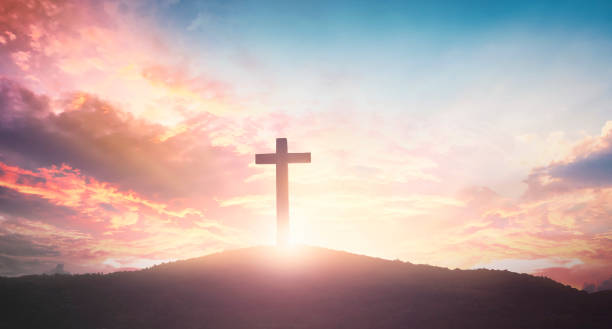 istock Easter concept: The cross on mountain sunset background 1215655721