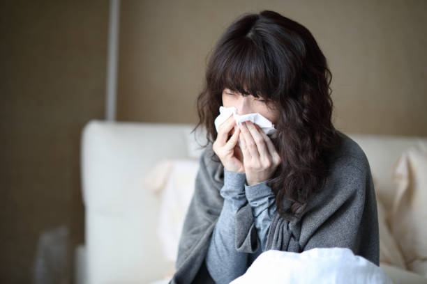 istock Sick woman with high fever 1215664022