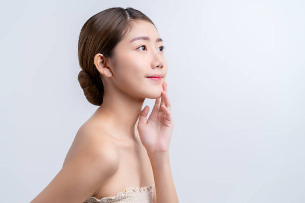 スキンケアとメイクアップコンセプト美しいアジアの女性女性、健康な顔の肌を持つポートレートスタジオショット - 美容ケア ストックフォトと画像