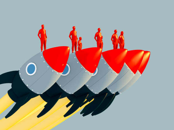 istock 3D illustration business metaphor Progress and innovation technology with group of businessman stand on red rockets launch successful Leadership motivation concept. 1215665842