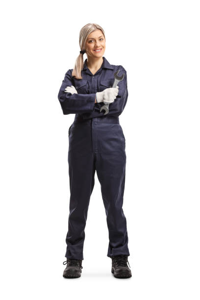 istock Female worker in a uniform holding a wrench 1215667265
