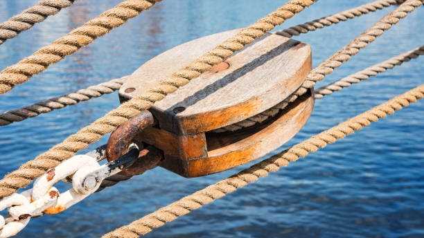Wooden pulley on  old yacht. stock photo