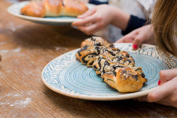 istock poppy bun is on the plate. cooking process 1215669002