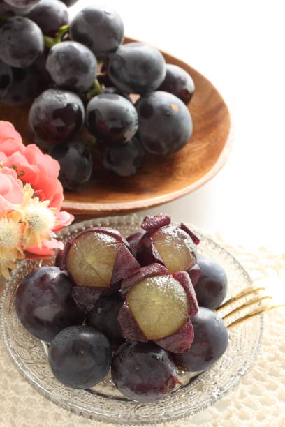 istock peeled Japanese grape on dish with copy space 1215669400