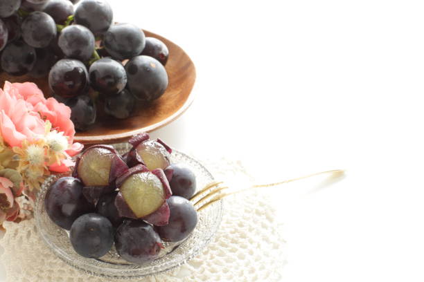 istock peeled Japanese grape on dish with copy space 1215669419