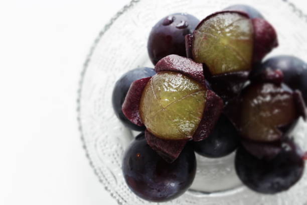 istock peeled Japanese grape on dish with copy space 1215669598