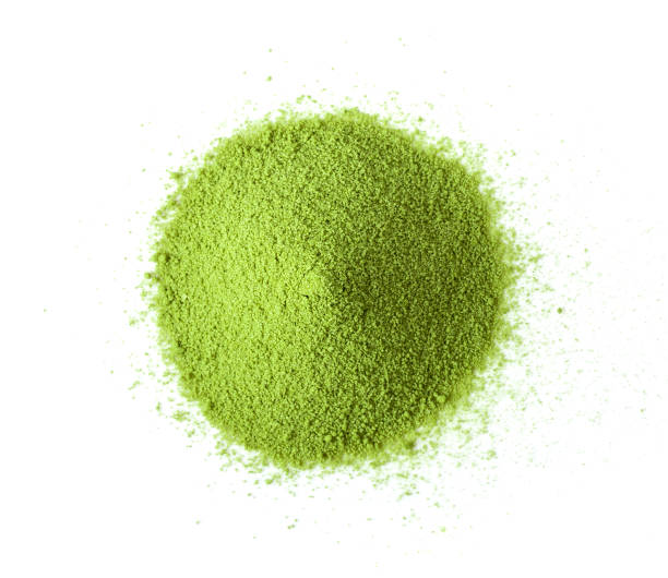 istock matcha green tea powder on white background. top view 1215672730