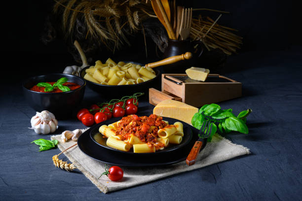 istock Rigatoni pasta with Bolognese sauce and fresh basil 1215674229