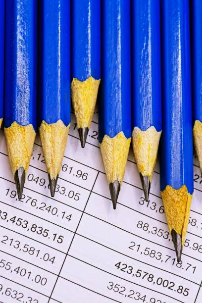 sharp blue pencils on financial statement. - mathematical symbol mathematics pencil sharp imagens e fotografias de stock