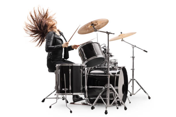 istock Female drummer playing the drums and throwing hair back 1215674783