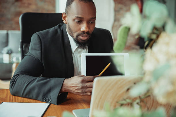 istock Businessman or student working from home while being isolated or keep quarantine 'cause of coronavirus COVID-19 1215674863