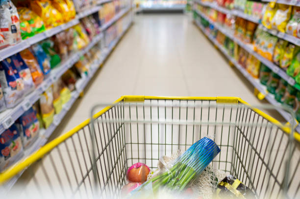istock shopping cart in supermarket 1215675128