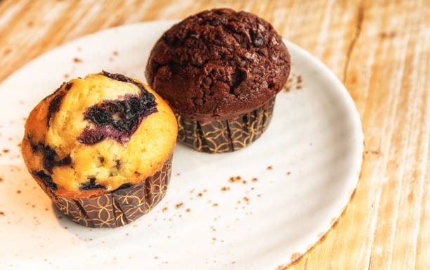 istock Chocolate and blueberry muffins 1215675580