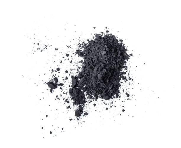 istock Activated charcoal powder isolated on white background. 1215676707