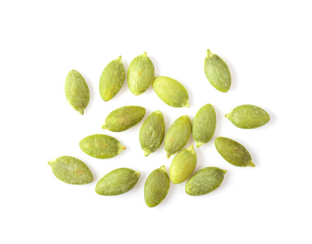 istock Pumpkin seeds isolated on white background 1215676989