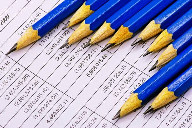 sharp blue pencils on financial statement. - mathematical symbol mathematics pencil sharp imagens e fotografias de stock