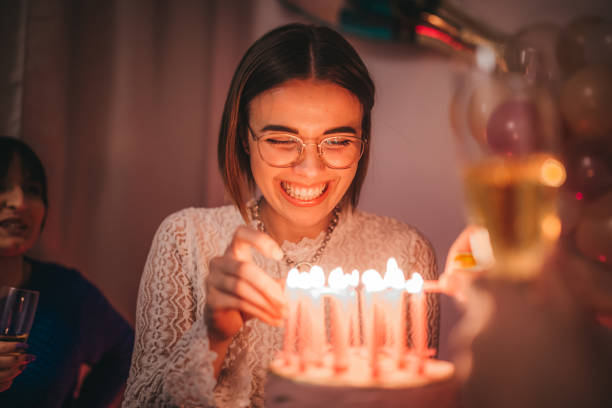 istock Friends celebration birthday with cake 1215678323