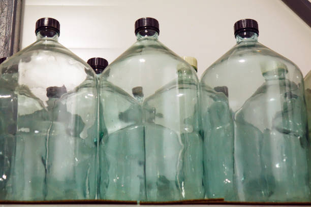 Large glass bottles. storage stock photo