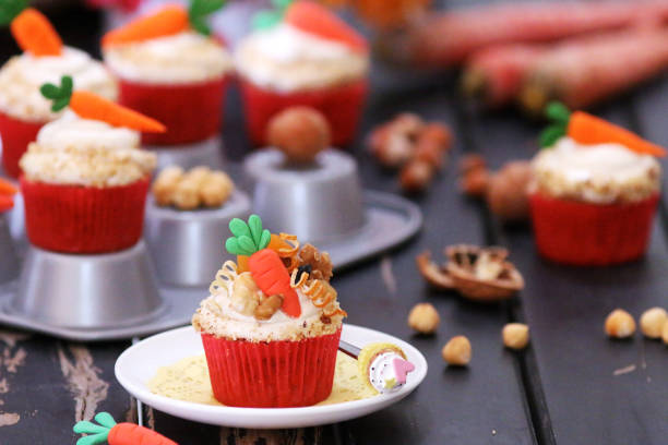 istock Easter cupcakes baked with carrot decorated with small figures 1215679753
