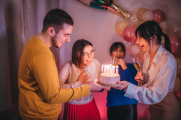 istock Friends celebration birthday with cake 1215680177