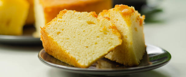 istock Portion of Madeira ring loaf cake served on a small plate 1215680387