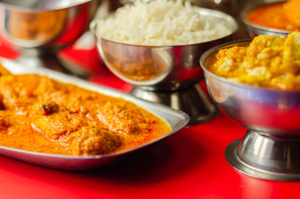 istock Mild chicken Korma and chicken Tikka Masala with Basmati rice 1215680770