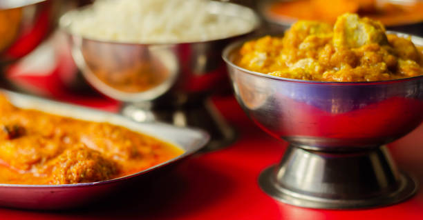 istock Mild chicken Korma and chicken Tikka Masala with Basmati rice 1215680913