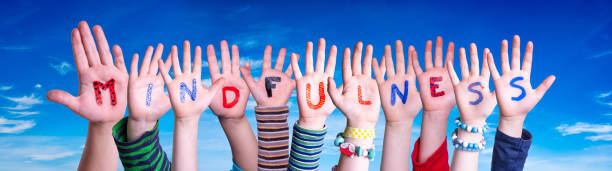 Children Hands Building Word Mindfulness, Blue Sky Children Hands Building Colorful English Word Mindfulness. Blue Sky As Background mindfulness kids stock pictures, royalty-free photos & images