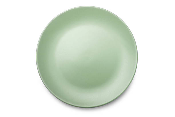 istock Empty ceramics plate isolated on white background with clipping path 1215682173