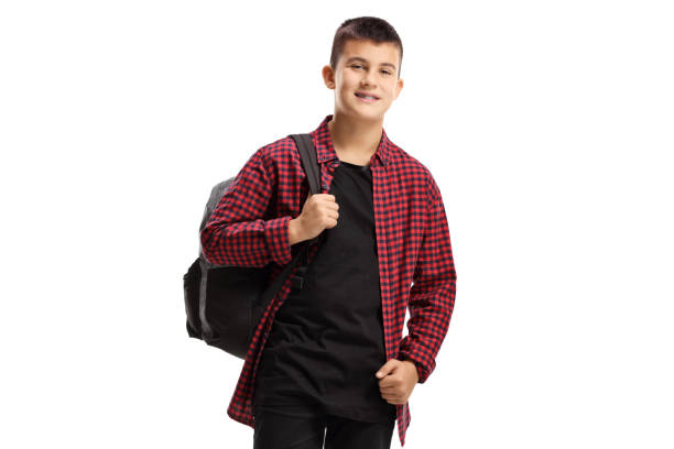 istock Teenage boy with a backpack smiling at the camera 1215684258
