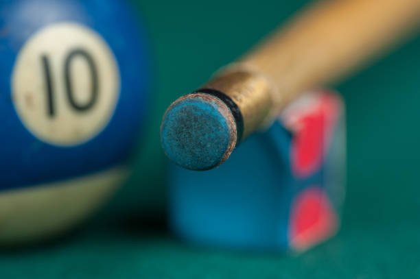 istock Billiards balls and cue on billiards table. Billiard sport concept 1215684607