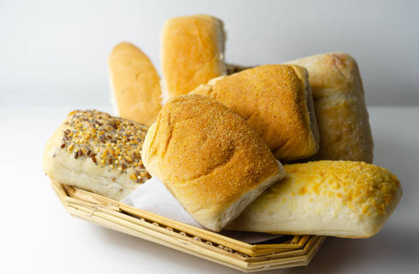 istock Various types of bread served on a wicker tray, delicious and fresh rolls 1215684618
