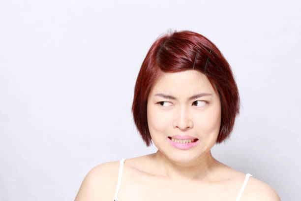 istock Asian Woman Face 1215685331