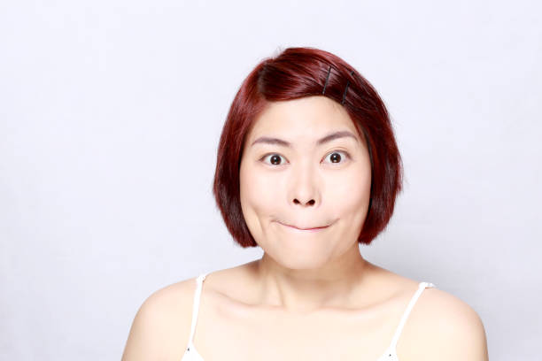 istock Asian Woman Face 1215685391