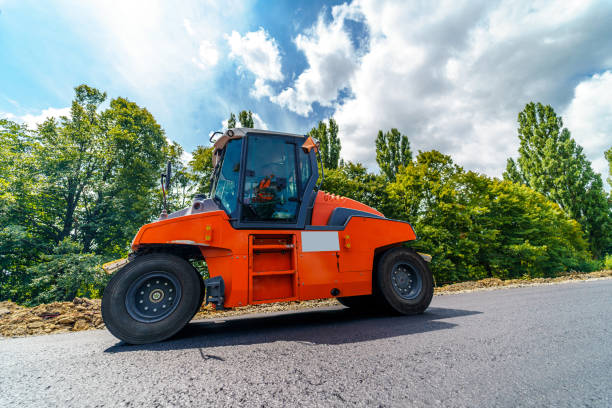 istock Road roller flattening new asphalt. 1215685438