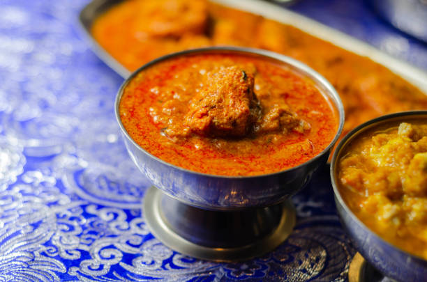istock Mild chicken Korma and chicken Tikka Masala with Basmati rice 1215685718