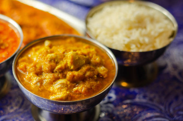 istock Mild chicken Korma and chicken Tikka Masala with Basmati rice 1215686093