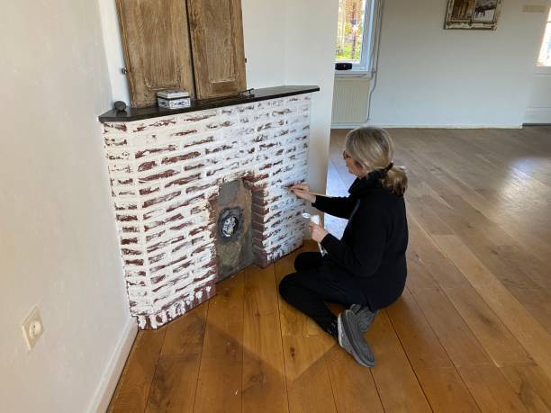 istock Painting the wall 1215687920