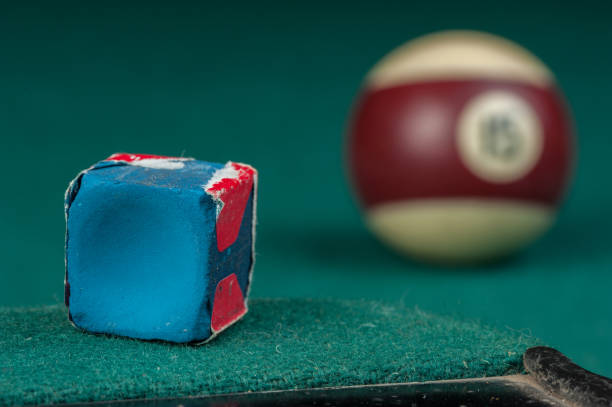 istock Billiards balls and cue on billiards table. Billiard sport concept 1215688712